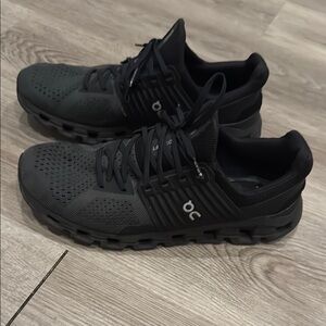 On Running Black Athletic Shoes with CloudTec Sole